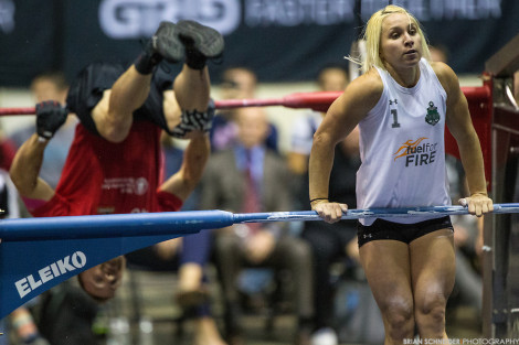 Sept 24, 2014; Charlotte, NC, USA; The Boston Iron #1 Natalie Newhart competes a bar muscle-up against the San Francisco Fire in the National Professional Grid League (NPGL) GRID Quarterfinals match at the Bojangles Coliseum in Charlotte, NC. Mandatory Credit: Brian Schneider/NPGL